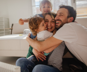 family having a group hug